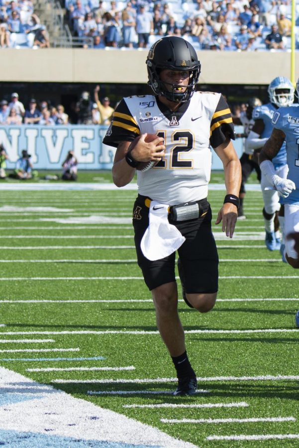 Junior Quarterback Zac Thomas runs in a 34-31 win over UNC. Thomas finished the game with 56 yards rushing on six carries. 
