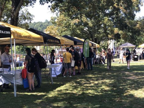 Students congregate around tents during Health, Wellness and Safety Week. One of these resources students can take advantage of is the Personal Excellence through Academic Knowledge program held through the student learning center.