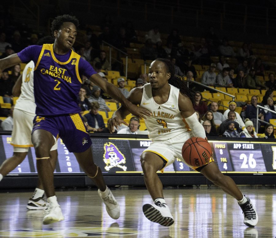 Guard OShowen Williams drives during App States 68-62 win over East Carolina on Nov. 12. Williams and teammate Isaac Johnson inked pro deals with European teams this week.