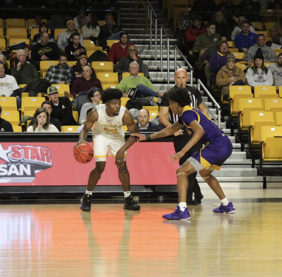 Sophomore guard Adrian Delph dribbles the ball during App States 68-62 win over East Carolina on Nov. 12. Delph scored a game-high 19 points against St. Andrews.