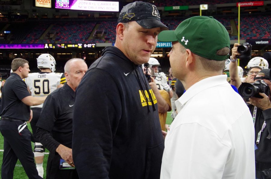 App State head coach Shawn Clark greets Alabama at Birmingham head coach Bill Clark after the Mountaineers beat the Blazers 31-17 in the R+L Carrier New Orleans Bowl.