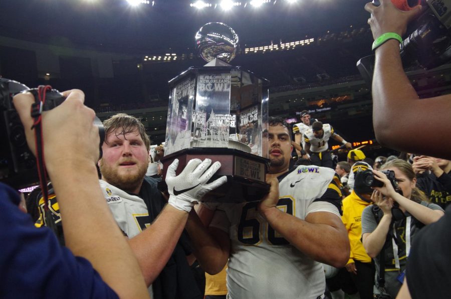 App State hoisted the R+L Carriers New Orleans Bowl trophy for the second straight year after beating UAB 31-17. 