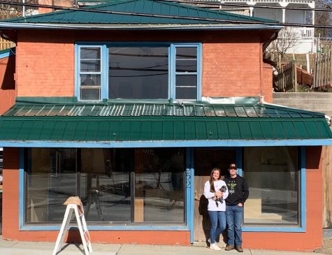 The Northerns stand in front of the new location of Blue Deer on King located next to Fruits, Veggies, and More.