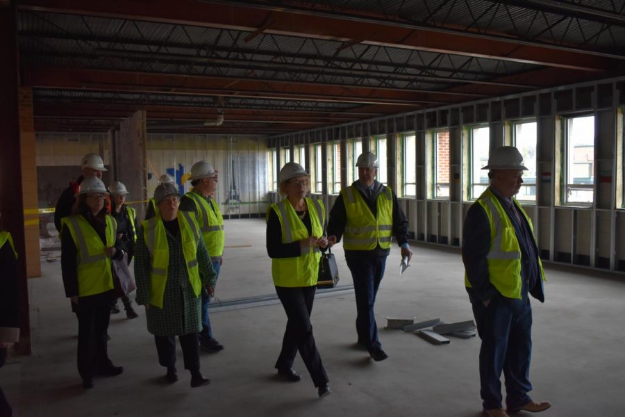 University officials make their way through Sanford Hall as it currently stands on Feb. 19. Nick Katers, associate vice chancellor for facilities management, said that the building already had a good structure and base and that 