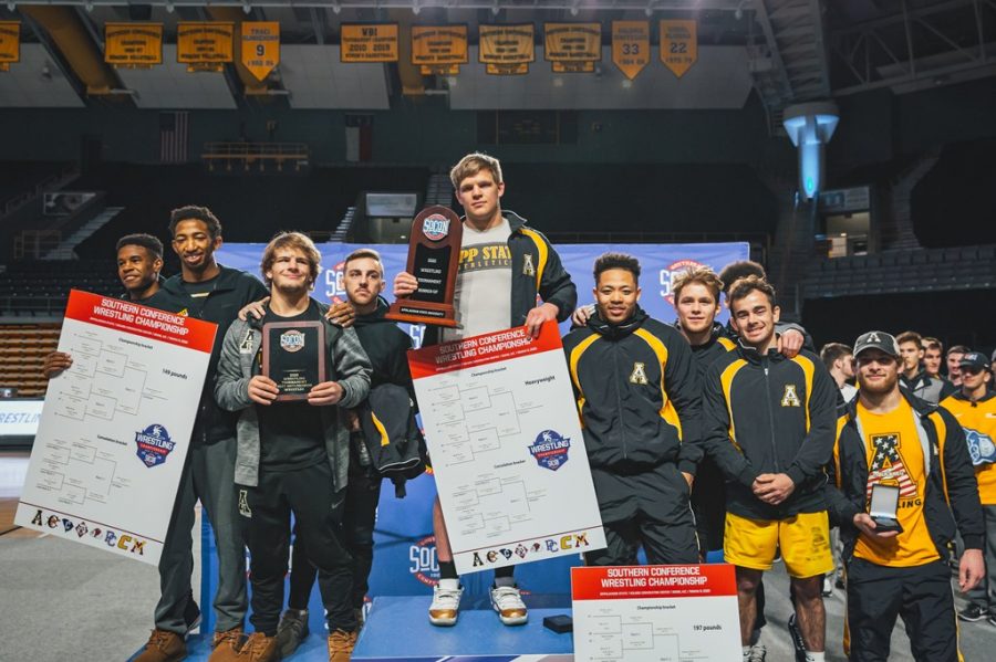 Members+of+App+States+wrestling+team+pose+for+a+photo+after+the+SoCon+Championships+on+March+8.+The+Mountaineers+had+four+conference+champions+and+a++program+record+six+total+NCAA+qualifiers+before+the+season+was+canceled+due+to+COVID-19.+