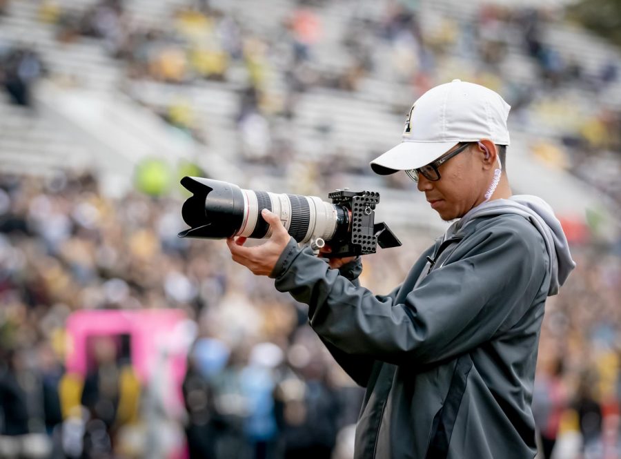 App State student and football video team member Vince Fortea shoots during a game in 2019. The football video team won first place in the Short Social category at this years SAVVY awards.