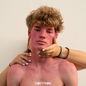 Harrison SmithMartin is Yarou in promo for his album, NEVER WEARING SUNSCREEN AGAIN.