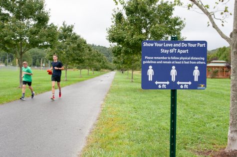 Physical distancing is encouraged for those using the Boone Greenway trail while exercising.