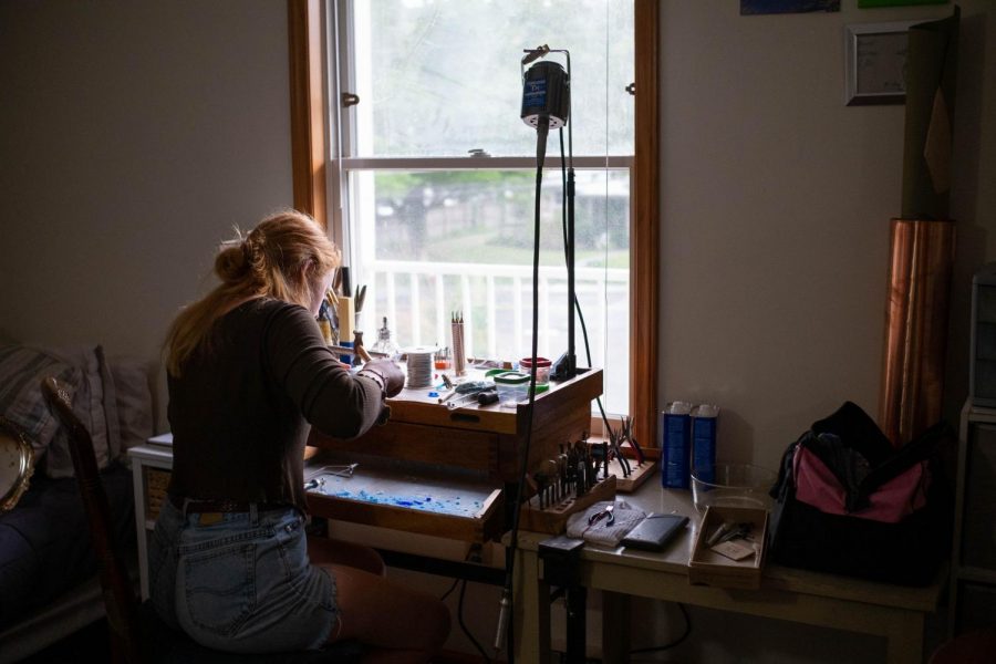Elizabeth Walton, junior, works in the at-home studio she has set up to continue her business even during the COVID-19 pandemic. September 8, 2020.