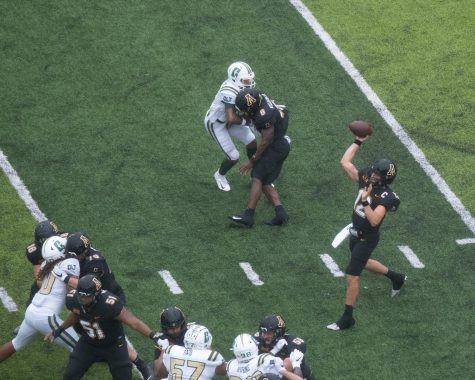 App State senior captain and QB Zac Thomas makes a throw during App State's season-opening 35-20 win over Charlotte Sept. 12 at Kidd Brewer Stadium.
