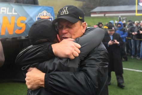 App State defensive coordinator Dale Jones celebrates the Mountaineers 2018 Sun Belt Championship win over Louisiana with an embrace. After spending 2019 at Louisville on former App State head coach Scott Satterfield's staff, Jones is back in Boone for his 24th year with the Mountaineers.