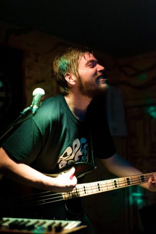 Lucas Triba performing with his band Speedball. The band created an inviting atmosphere for other local bands at Noble Kava after meeting during an open mic night.