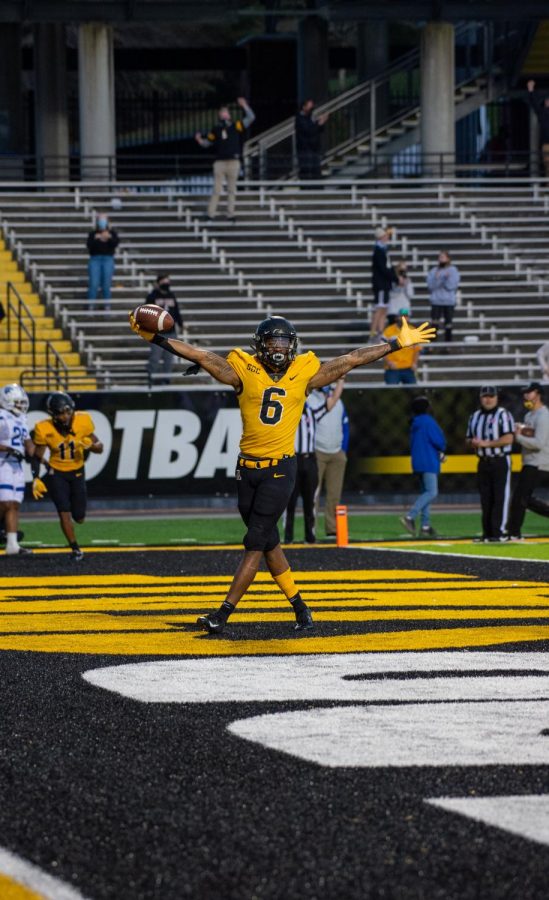 App State sophomore running back Camerun Peoples celebrates after scoring the game-winning touchdown in the fourth quarter. 