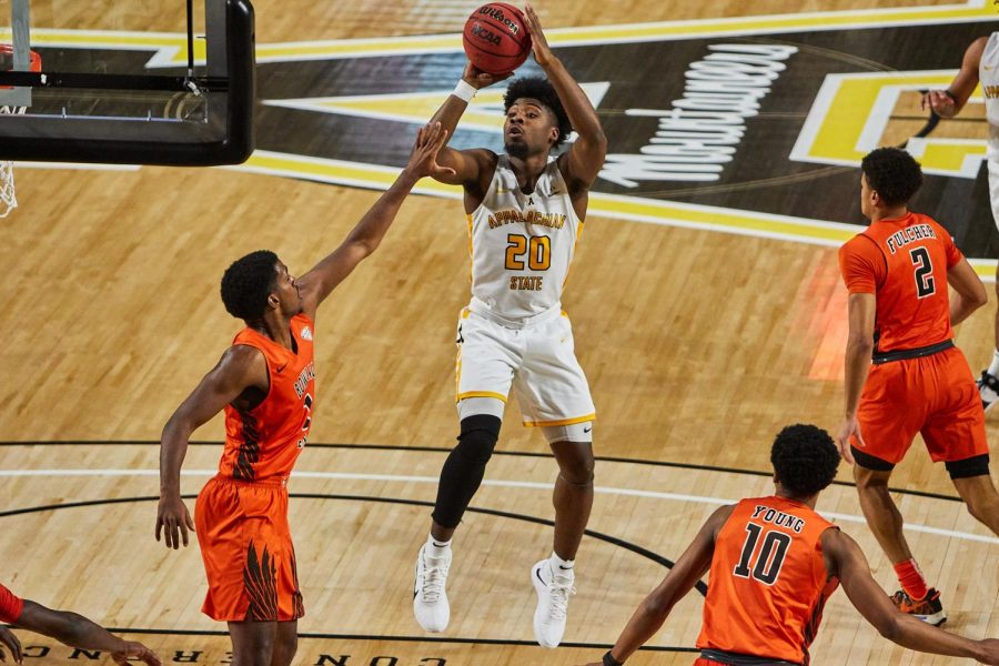 App State junior guard Adrain Delph pulls up against Bowling Green Nov. 30. Delph tied his career-high with 21 points against Charlotte on Friday, including the game winning step back three-pointer.  