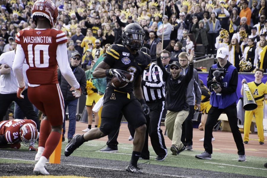 Former App State standout running back Darrynton Evans scores a touchdown in the 2019 Sun Belt Championship game. “The first event the commission assisted was the Sun Belt football Championship when App State hosted the University of Louisiana at Kidd Brewer Stadium in Boone,” said Jackson. 