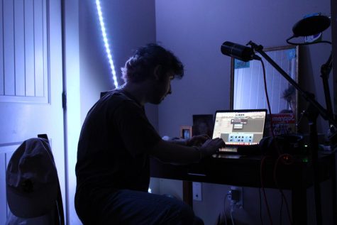Former App State student Donald Steel at work at his computer. Steel created his podcast, FallrisK, to highlight local talent in Boone. 