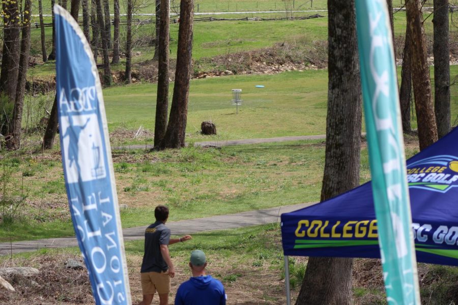 App State disc golfer Matt DaCosta watches a drive sail towards the basket at the collegiate disc golf national championships April 7-10 in Marion, NC.