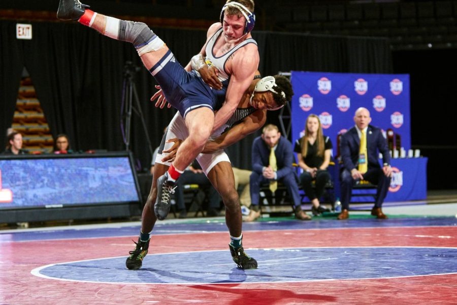 App State junior wrestler Jonathan Millner slams Chattanoogas Tanner Smith in the 2020 Southern Conference title match. Millner is the reigning back-to-back SoCon champ at 149 pounds, and is a combined 20-0 in conference duals the past two seasons. This year, he also became the fourth All-American under App State head coach JohnMark Bentleys leadership.
