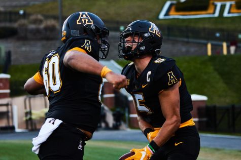 After the 2020 season, App State senior wide receiver Thomas Hennigan (right) opted to utilize his extra year of eligibility granted by the NCAA due to complications from the pandemic. Former teammate Noah Hannon (left) elected to move on from App State. 