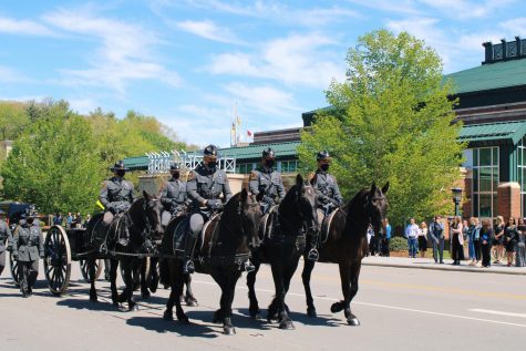 The North Carolina Troopers Association Caisson Unit assisted in the procession on Thursday afternoon for Sgt. Chris Ward and K-9 Deputy Logan Fox.