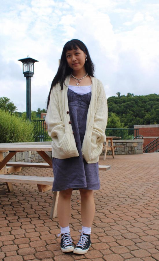Wearing an oversized thrifted cardigan, Ailysa Lee describes her style as “all over the place.” Aiming for a “soft girl” and dainty look, Lee took advice from her sister that she should dress according to the weather in Boone.  