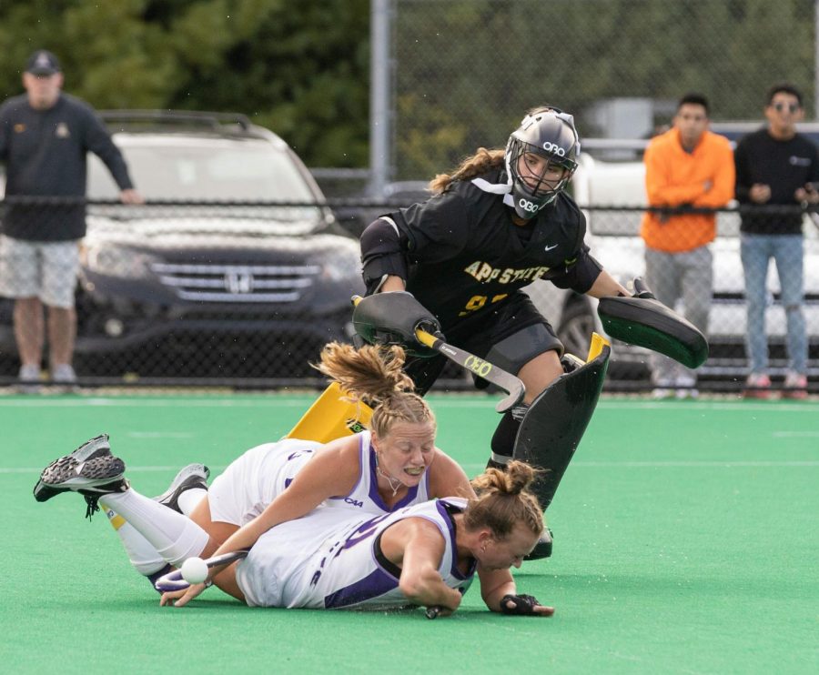 Junior goalkeeper Addie Clark watches as two JMU players collide and collapse to the ground. Clark made eight saves against JMU and 10 saves in the Sept. 12 matchup with OSU.