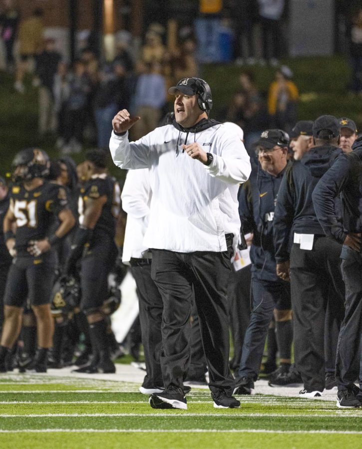 Head coach Shawn Clark coaches the Mountaineers to a late comeback victory against Marshall. App State defeated the Thundering Herd 31-30 behind 187 rushing yards from sophomore back Nate Noel and three touchdowns by junior back Cam Peoples.