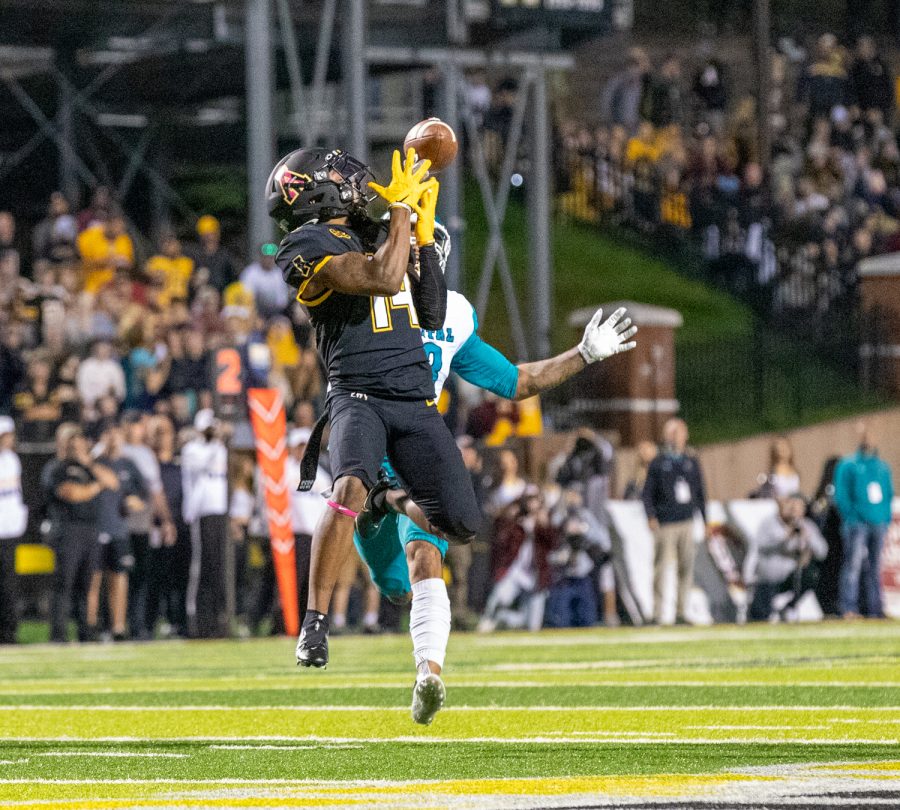 Super senior Malik Williams catches a deep ball over the Chanticleer defense, adding to his 206 total-yard night. Williams racked up those yards in 10 receptions, also snagging one touchdown. 
