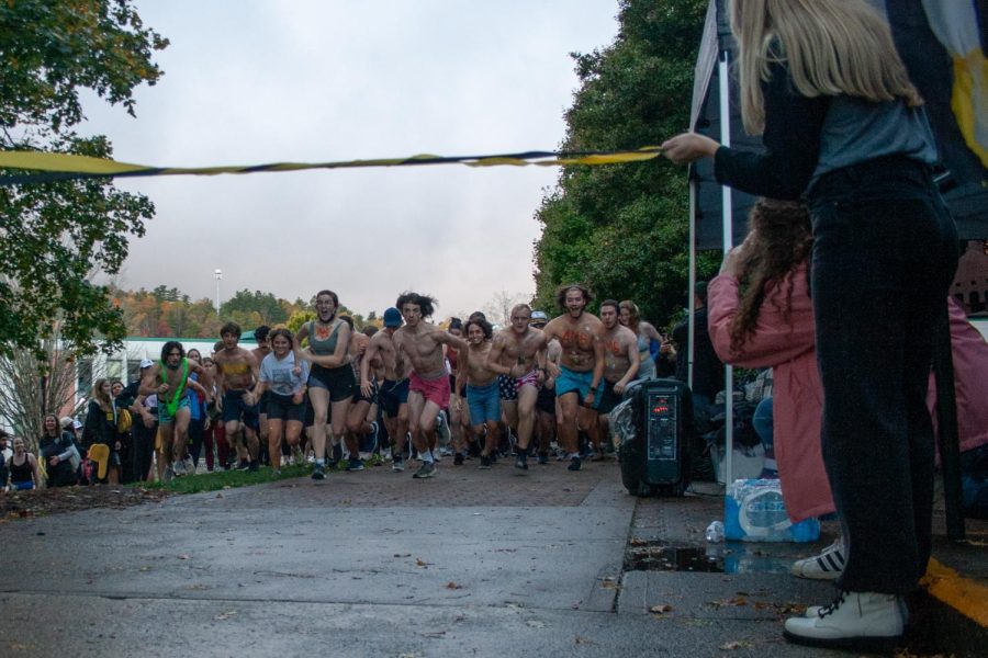 Participants in the Neerly Naked Mile take off, beginning their loop around campus, going past East Hall, through Durham Park, along Rivers Street, and past Edwin Duncan back up toward Plemmons Student Union. 
