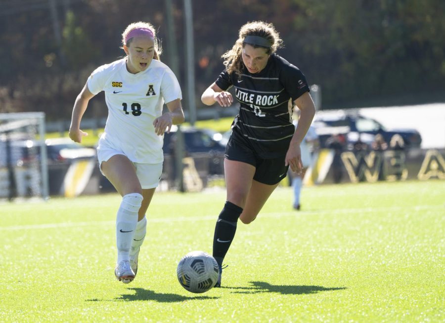 Freshman forward Carly Lantz dribbles past a Little Rock defender on her attack. Lantz has recorded three goals in her first season as a Mountaineer. 