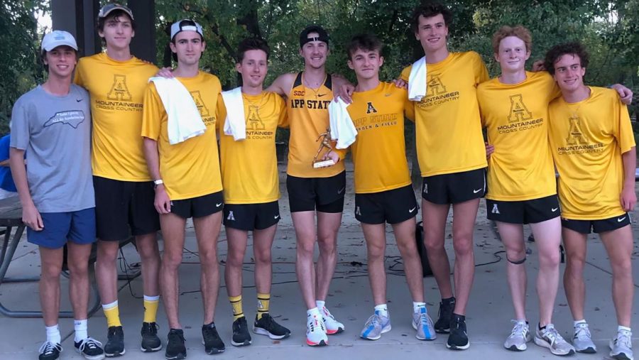 The men’s cross country team poses after capturing a first place finish at the Wildcat XC Classic. Five men finished within the top five at the event. 