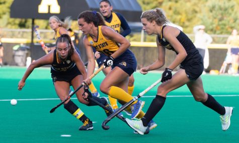 Senior midfielders Anna Smarrelli and Friederike Stegen challenge a Kent State attack by Clara Rodriguez Seto. The Mountaineers struggled to contain Rodriguez Seto as she scored both goals in the 2-1 victory for the No. 22 Golden Flashes. 