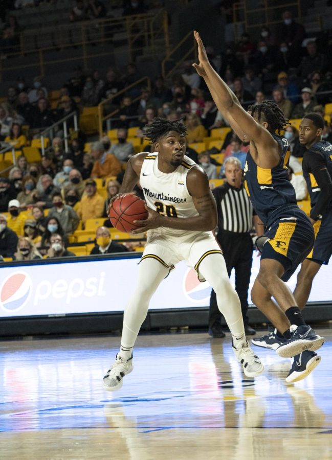 Senior Adrian Delph jumps to a stop at the high post in App State's home opener. Delph scored 72 points across the Mountaineers' three games in the Gulf Coast Showcase.  