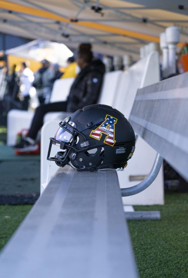 The Mountaineers sported American flag-themed helmets in celebration of Heroes Day Saturday. 