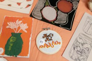 A spread of illustrations and embroidery by Andie Aldred and Lorena Calvillo.