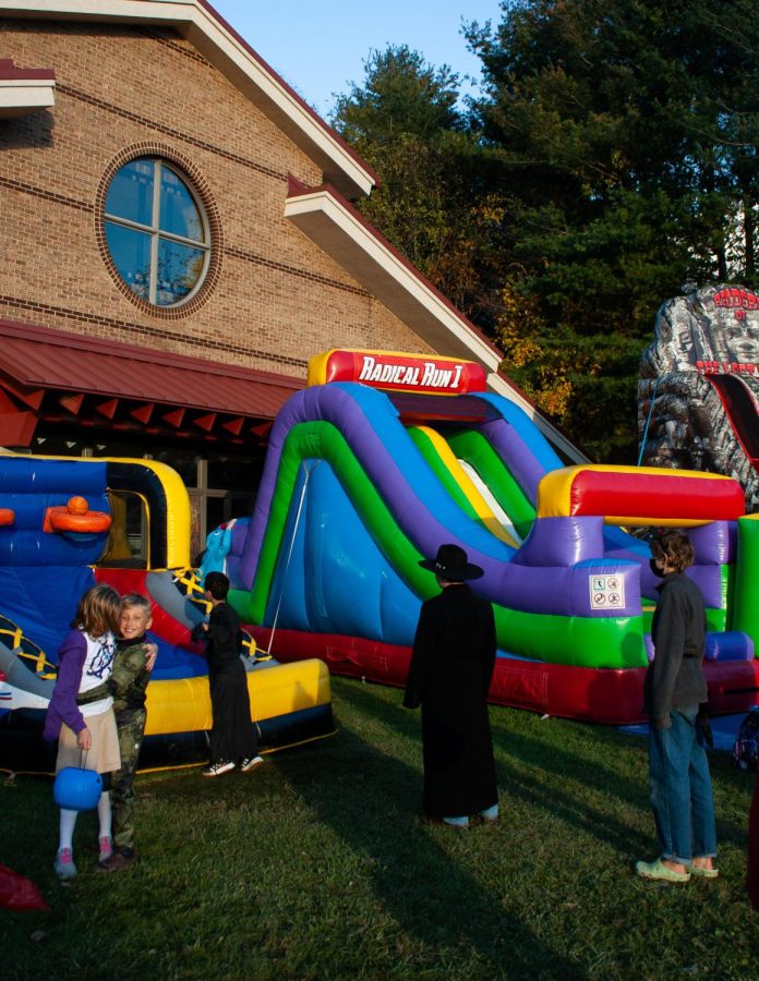 With an effort to make Boone Boo family-friendly, several activities were set up for kids, like bouncy houses, slides, haunted tunnels, and plenty of candy. 