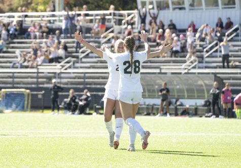 Sophomore forward Breckyn Monteith celebrates one of her two goals against Little Rock Oct. 24. The Mountaineers held on to defeat the Trojans 2-1. 