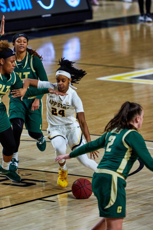 Junior guard Janay Sanders slices into the paint against Charlotte Nov. 25. Sanders averaged 6.7 points per game and shot a team high 120 free throws last season. 