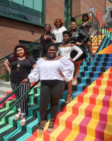 Members of Queen In You pose for a portrait outside of Turchin Center for the Visual Arts. QIU serves young women of color by offering community service, social events and mentorships in professional etiquette and life planning.