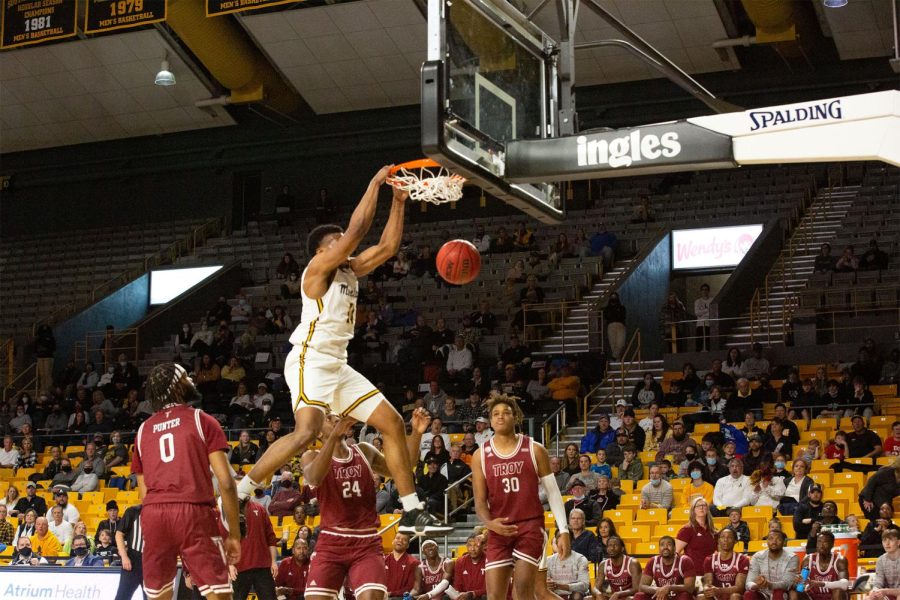 Junior forward Donovan Gregory slams home a two-handed dunk against Troy Feb. 17, 2022. 