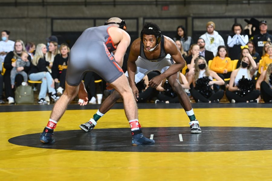 Redshirt senior Jonathan Millner challenges a Campbell wrestler in the 19-13 match victory Feb. 13, 2022. 