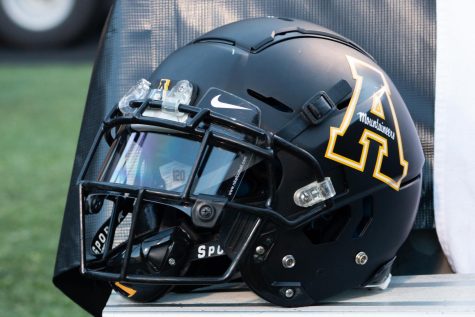 An App State helmet sits on a bench before the Mountaineers one-point victory over Marshall Sept. 23, 2021. 