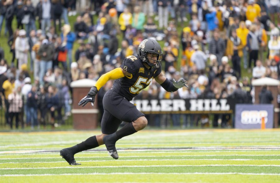 Former App State linebacker DMarco Jackson rushes to the ball against ULM Oct. 30, 2021. 