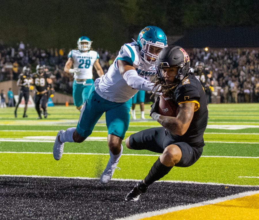 Former App State receiver Corey Sutton makes a touchdown grab in a win over Coastal Carolina Oct. 20, 2021. Sutton earned first-team All-Sun Belt honors in his final season.