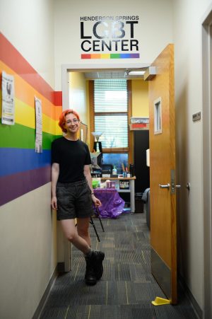 Pascale Bouchard, the new LGBTQ Center graduate assistant, stands in the entrance to the Henderson Springs LGBTQ Center in Plemmons Student Union Aug. 2, 2022. 