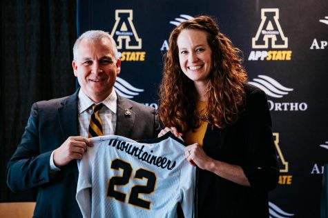 Volleyball head coach Sarah Rumely Noble poses with Athletic Director Doug Gillin at her introductory press conference for App State Jan. 20, 2022.
