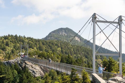 The Mile High Swinging Bridge basks in the sun on its 70th anniversary, 2022. Reconstructed with galvanized steel in 1999, this feat of engineering is often endearingly referred to as the ‘singing’ bridge due to the sound of the metal shifting in the wind. 