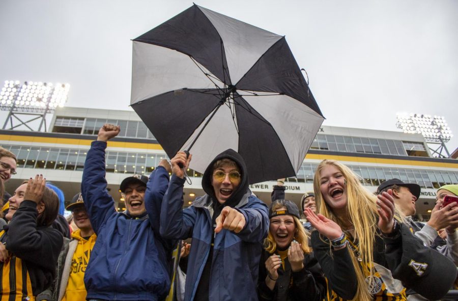 App State students cheer on the Mountaineers despite the rainy weather against The Citadel Oct. 1, 2022. 