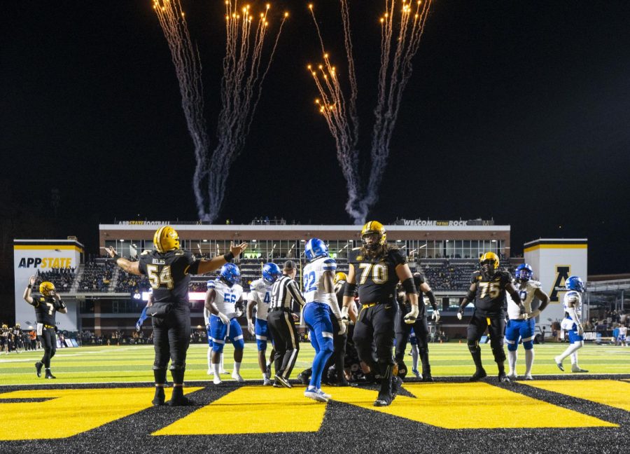 The fireworks go off and the mountaineers celebrate after redshirt junior Camerun Peoples scores a seven yard touchdown in the fourth quarter against Georgia State, Oct. 19, 2022. 