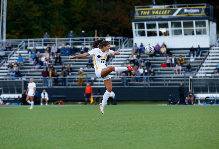 Junior defender Mumu Guisasola strikes the ball in the air during App States 0-1 loss to Georgia State Oct. 6, 2022. 